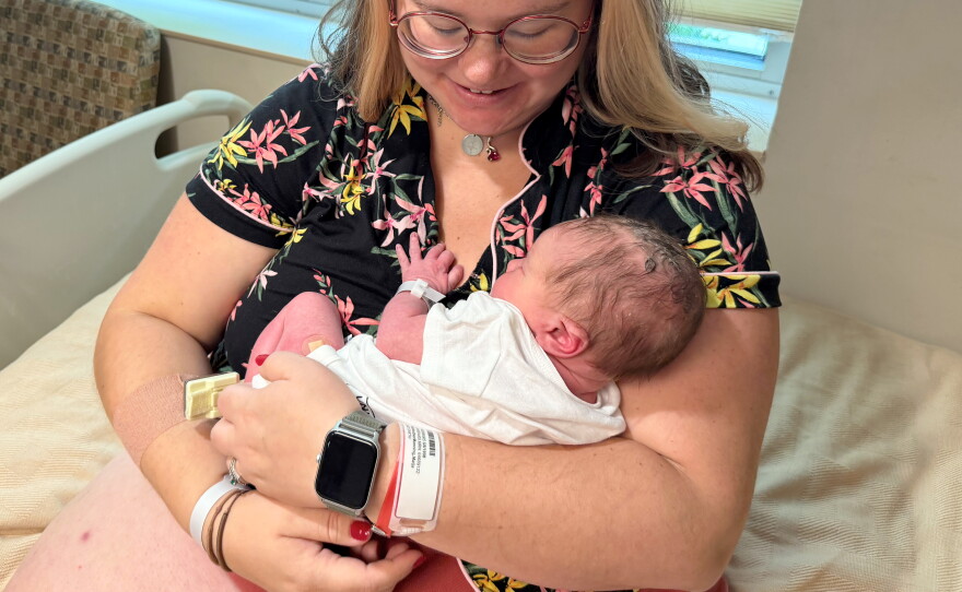 Maija Whitefeather-Manning, 28, cuddles her newborn baby, Corvus, at United Hospital District in Blue Earth, Minnesota- the only hospital in the region.