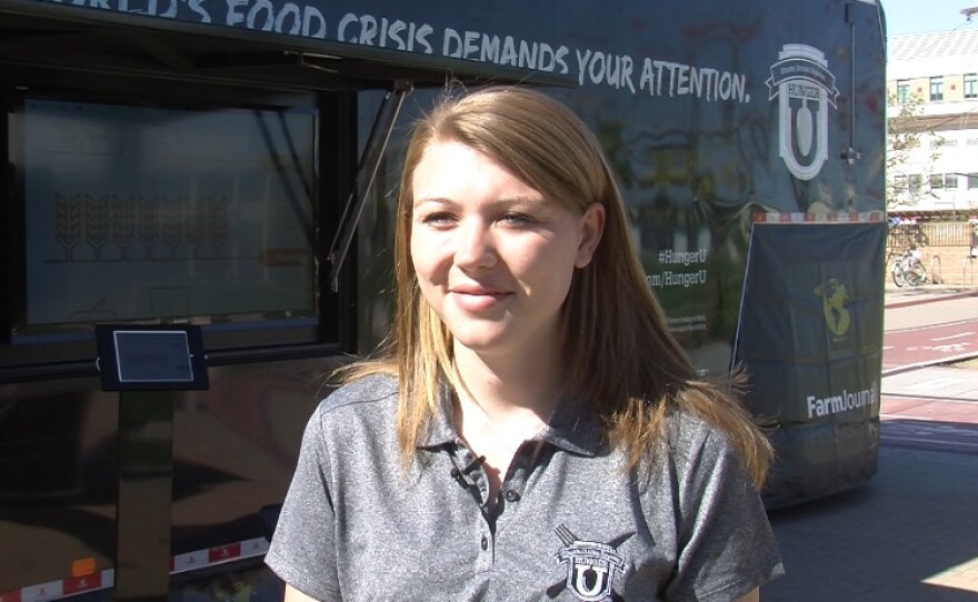 Katharine Nye, a HungerU staff member and sophomore at Utah State University, talks about world hunger during a stop at SDSU on Thursday, April 11, 2013.