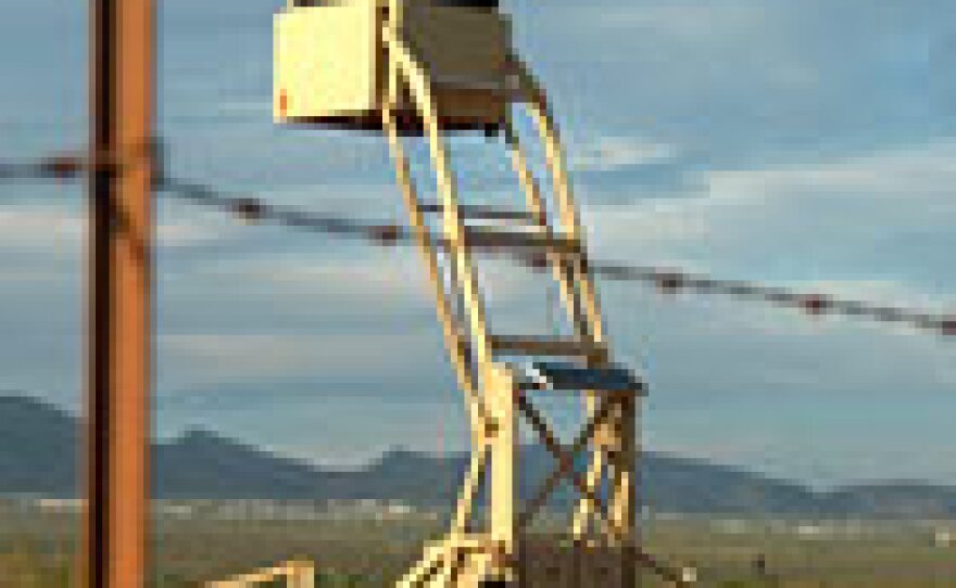 A watchtower on the U.S. side of the border, in Arizona, across from Sonora, Mexico. At night, agents use infrared devices to detect the movement of migrants in the desert.