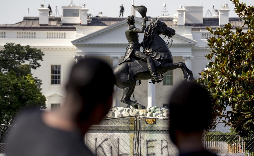 The Justice Department has charged four men in connection with the June 22 attempt to take down the statue of Andrew Jackson in Lafayette Park in Washington, D.C.