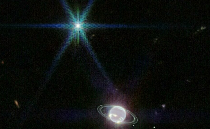 JWST's images of Neptune are some of the clearest of the planet's rings taken in decades. The bright bluish object is Neptune's large frozen moon, Triton.