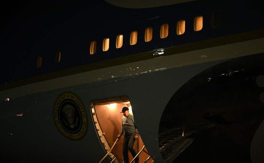 President Biden steps off Air Force One on Oct. 19 after a 30-hour trip to Israel and back. Biden is set to deliver a primetime address on Thursday evening.