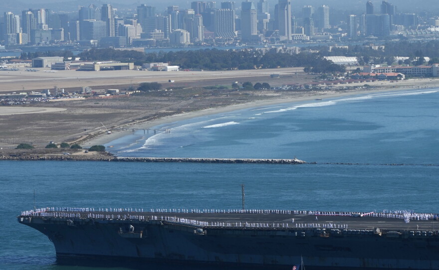 The USS Abraham Lincoln aircraft carrier returns to the San Diego Bay after deployment Thursday, Oct. 8, 2026, in San Diego.