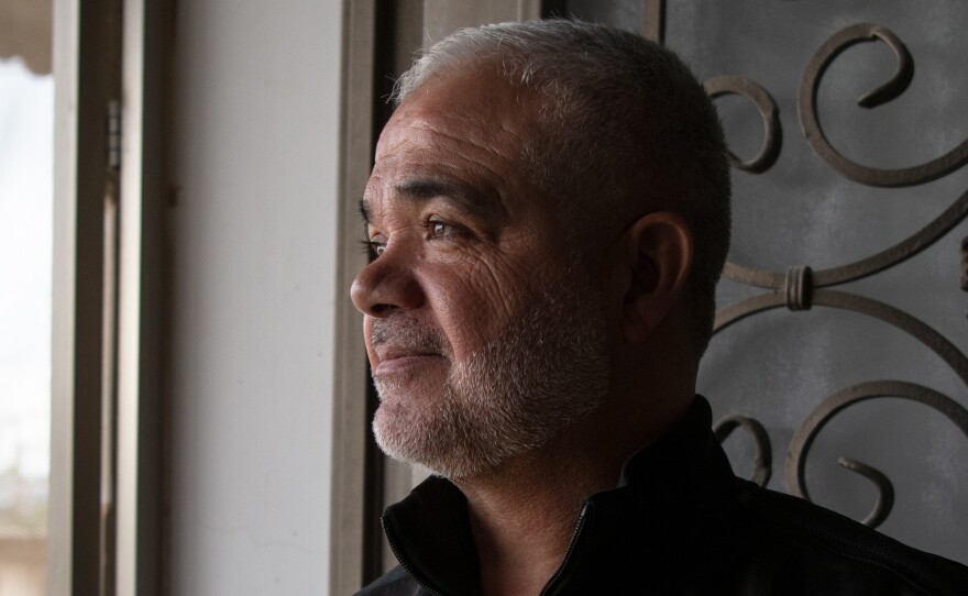 Pastry maker Rafe' Rummaneh, shown here in his home outside Ramallah in the occupied West Bank on April 9, is only making a few treats for friends this Eid.