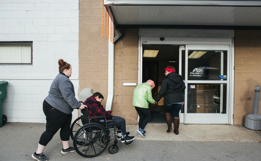 Pauline (far right) leads fellow group home housemates into a day program at the Arc Northeastern Pennsylvania.