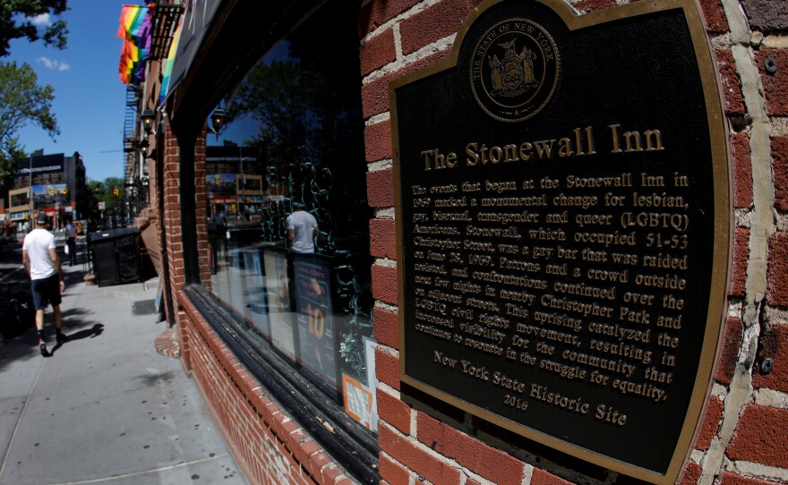 A man walks past New York's Stonewall Inn, site of the 1969 uprising considered the birth of LGBTQ movement.