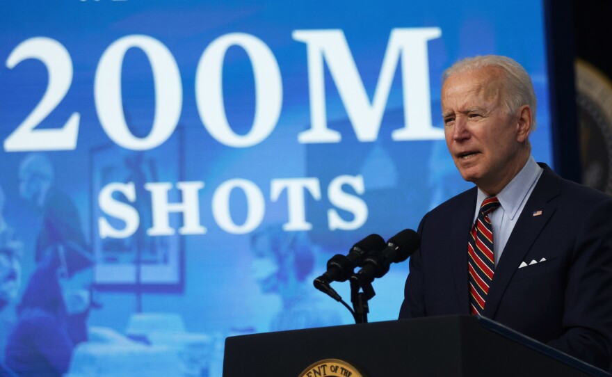 President Biden marks hitting a goal of 200 million shots in arms by his 100th day in office during remarks at the Eisenhower Executive Office Building on April 21.