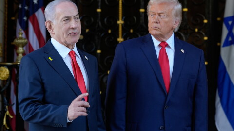 President Donald Trump listens as Israel's Prime Minister Benjamin Netanyahu speaks at President Donald Trump's Mar-a-Lago club, Dec. 29, 2025, in Palm Beach, Fla.