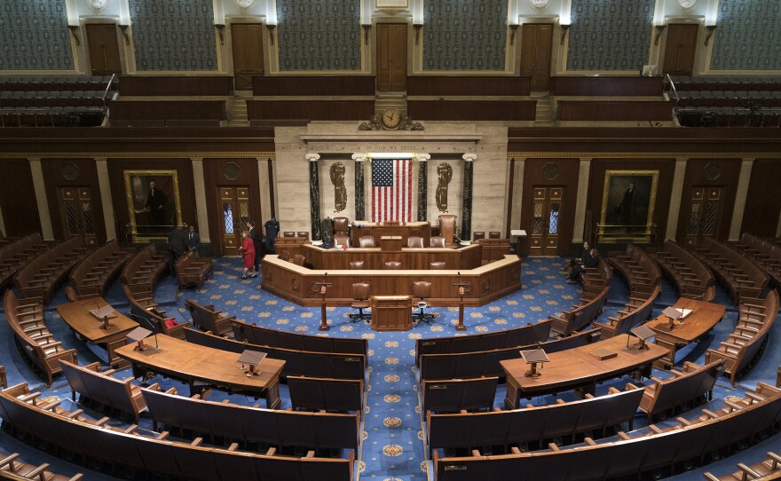 In this file photo from Jan. 3, 2019, the House of Representatives chamber is seen on the first day of the 116th Congress. The coronavirus pandemic is raising the issue of whether there should be remote voting to enable lawmakers to cast votes without all lawmakers needing to return to Washington.
