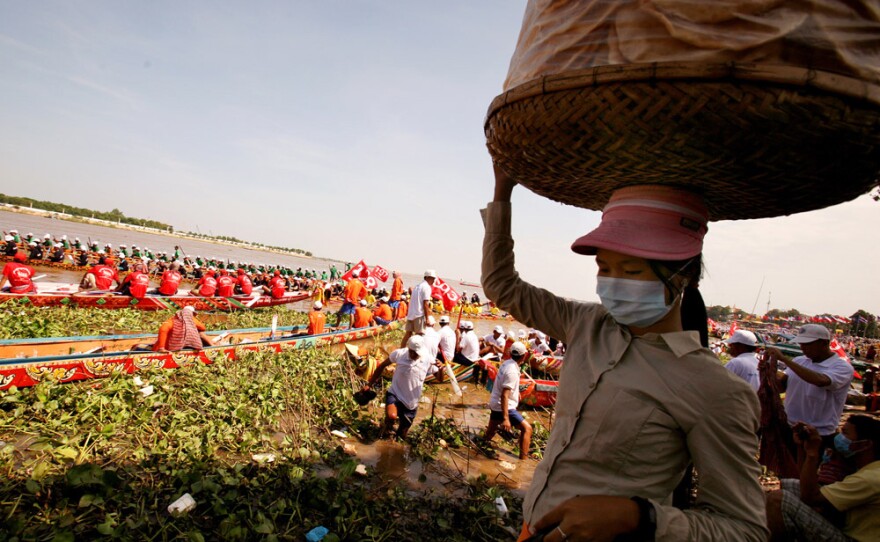 Hundreds of boat crews celebrate the annual water festival on the river in Cambodia's capital, Phnom Penh, in early November. The festival marks the day when the Tonle Sap River's current changes direction.