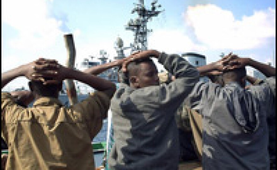This handout photo released by the French Ministry of Defense on Jan. 4 shows men accused of being pirates who were arrested by French soldiers in the Gulf of Aden.