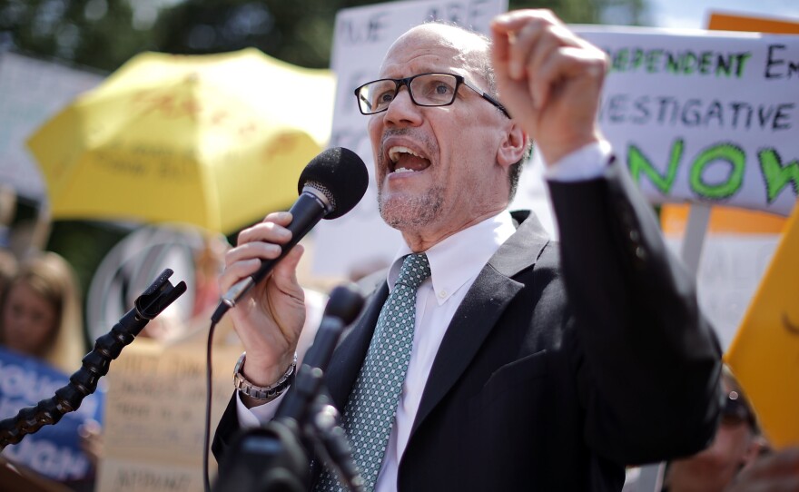 Tom Perez, seen at a rally protesting the firing of FBI Director James Comey in May 2017, has his work cut out for him as chairman of the Democratic National Committee.