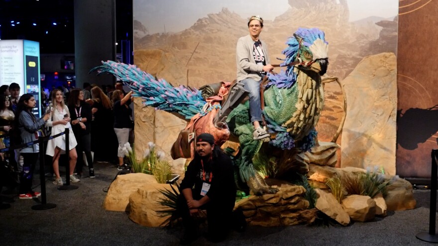 TwitchCon attendees pose with an installation on the convention floor on Sept. 20, 2024 at the San Diego Convention Center. 
