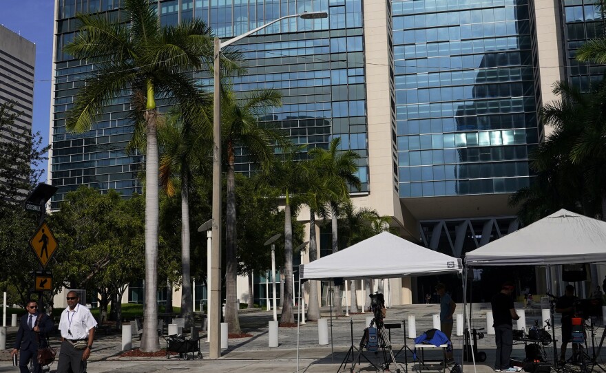 News media are set up outside of the Wilkie D. Ferguson Jr. U.S. Courthouse where a grand jury is meeting, Wednesday, June 7, 2023, in Miami.