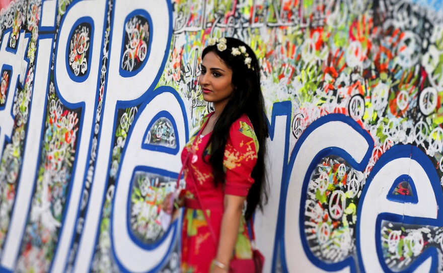 An Iraqi woman attends a festival commemorating the International Day of Peace in Baghdad on Monday.