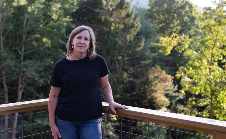 Karen Douthitt learned that a cousin on her mother's side had undergone genetic testing and was found to be a carrier of presenilin 1, a rare genetic mutation for early-onset Alzheimer's dementia. The cousin had developed the disease in her 50s.
