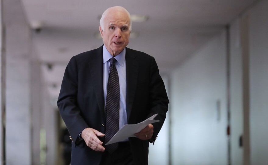 Senate Intelligence Committee member Sen. John McCain, R-Ariz., heads into a closed-door committee meeting with Director of National Intelligence Dan Coats on June 15 in Washington, D.C.
