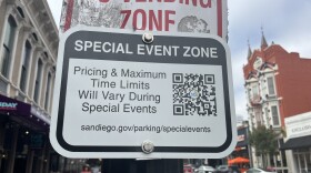 A "Special Event Zone" sign is attached to a 