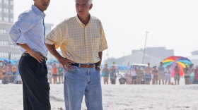 President Obama and Florida Gov. Charlie Crist walk along Casino Beach on Pensacola Beach, Fla., Tuesday while visiting the region affected by BP's Deepwater Horizon oil spill.