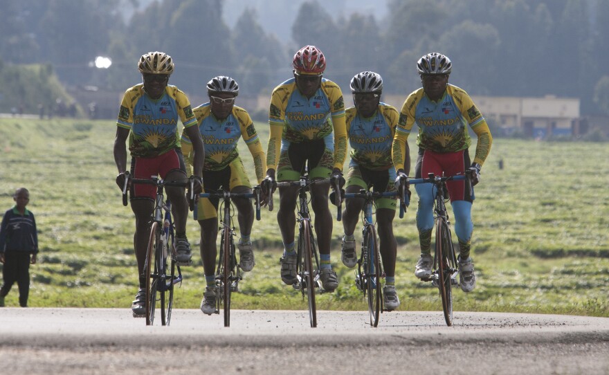 Team Rwanda rides together in a scene from the 2013 documentary Rising From Ashes.