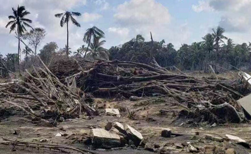 This Jan. 20 photo shows a beach resort hit by the post-eruption tsunami.