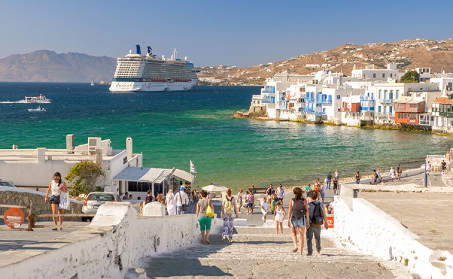 Cruise ship anchored near the “Little Venice” area of Mykonos town, on the Greek island of Mykonos. On "Rick Steves Cruising The Mediterranean," Rick sails from Barcelona to Athens, with exciting stops along the way in the French Riviera, Rome, Naples and more.