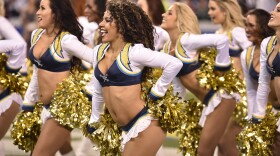 San Diego Chargers cheerleaders perform as the team plays the New England Patriots during the first half in an NFL football game on Dec. 7, 2014 in San Diego.
