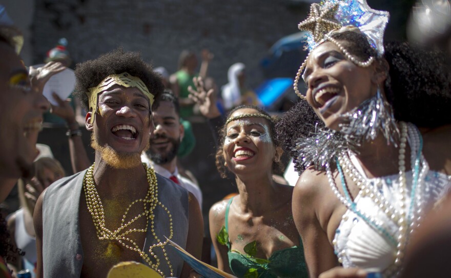 Revelers celebrate during the Carnival street parade of the Bloco das Carmelitas in the Santa Teresa neighborhood in Rio de Janeiro, Brazil, last week.