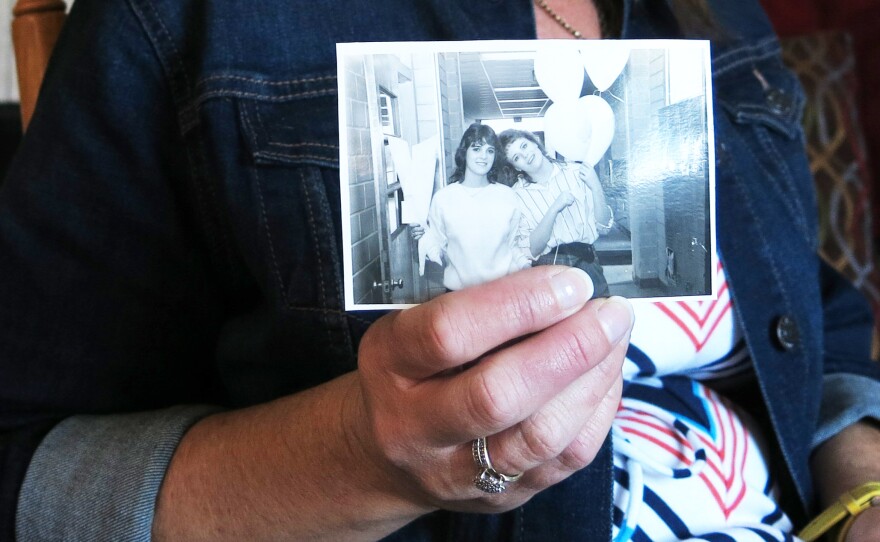 Dana Bowerman's lifelong best friend Michelle Elliott holds a photograph of the two together. Bowerman is serving a nearly 20 year sentence for federal drug conspiracy charges. She was holding out hope for clemency for nonviolent drug offenders but it is unlikely that she will receive an early release date.