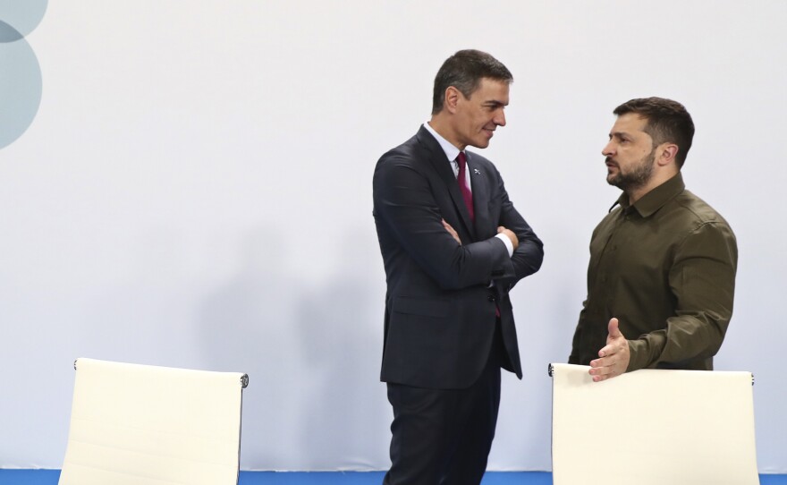 In this photo provided by the Spanish government, Spain's acting Prime Minister Pedro Sanchez, left, speaks with Ukraine's President Volodymyr Zelenskyy at the Europe Summit in Granada, Spain, Thursday, Oct. 5, 2023.