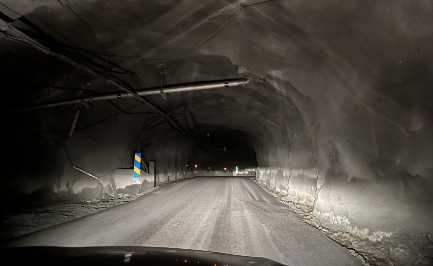 In the main tunnel into the LKAB mine, reflectors on the reinforced stone walls guide vehicles deep underground.