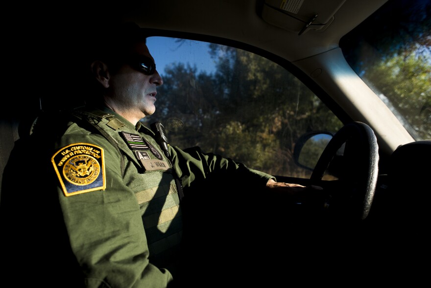 Joshua Wilson, a Border Patrol agent and vice president of the San Diego chapter of the National Border Patrol Council, drives along the U.S.-Mexico border near Jacumba in eastern San Diego County on Sept. 5, 2017. Wilson said some of the newer fencing has helped improve agent safety.