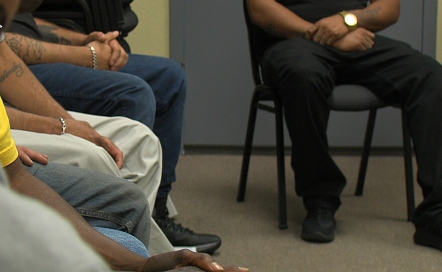 Members of the Drug Court program participate in a 12-step meeting, March 21, 2016.