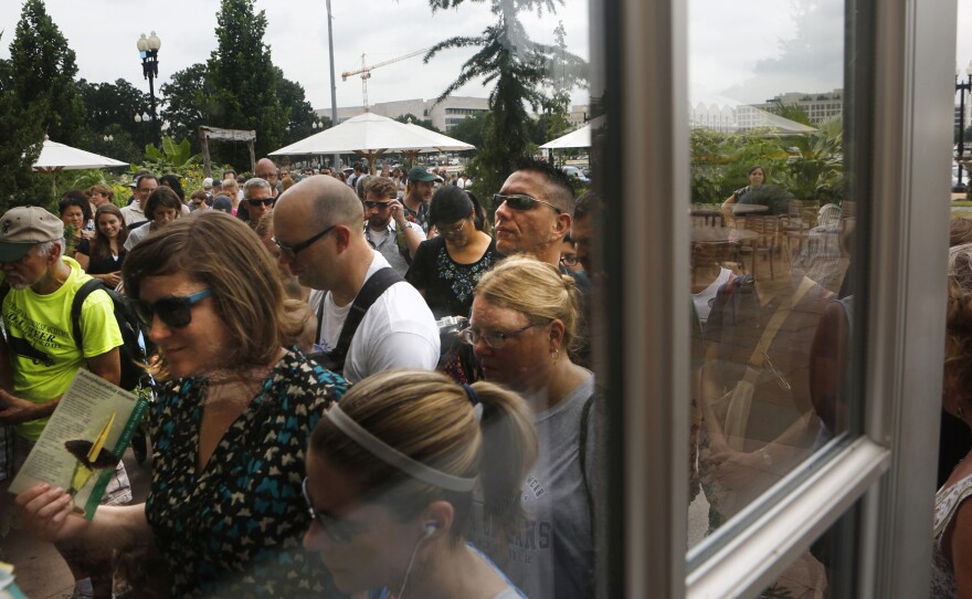 Crowds lined up around the Garden to see the corpse flower, known officially as "titan arum."