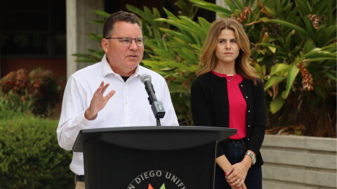 San Diego Unified board president Richard Barrera and vice president Shana Hazan speak outside the Eugene Brucker Education Center on Tuesday, June 23, 2026.