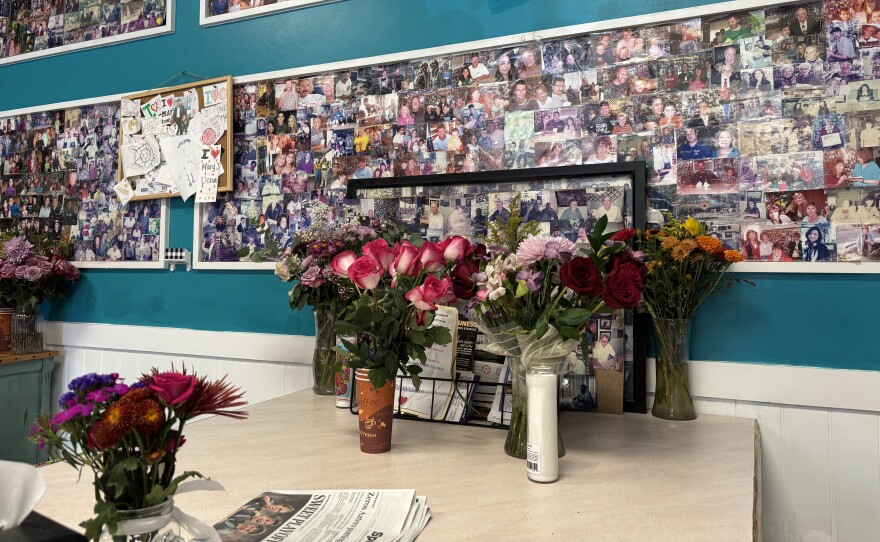 Those who knew Mary brought flowers, messages and candles to remember the donut shop owner. The memorial was on display when KPBS visited the shop on Oct. 27, 2025.