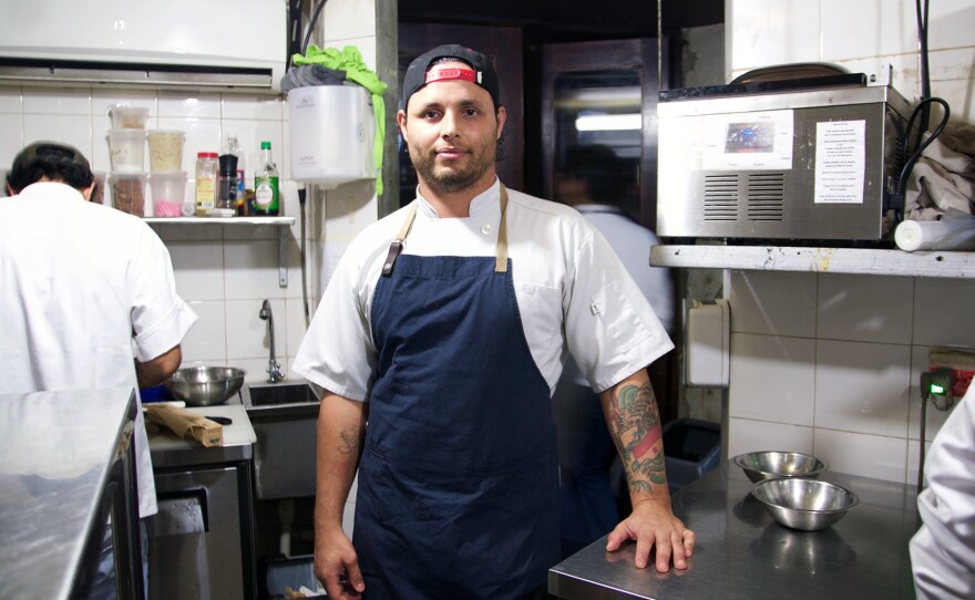 Chef Jose Carles poses in his kitchen. The 31-year-old left a career in Australia to launch his Panama City restaurant, Donde José.