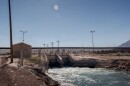 The All-American Canal is seen here in Imperial County, Calif. Jan. 24, 2022. Customs and Border Protection agents say this is a "high traffic" area for migrants. The border fence is just 26 yards south of the canal and the Interstate-8 highway is a short walk away. Migrants climb the fence, swim across the canal and meet a driver along the highway.