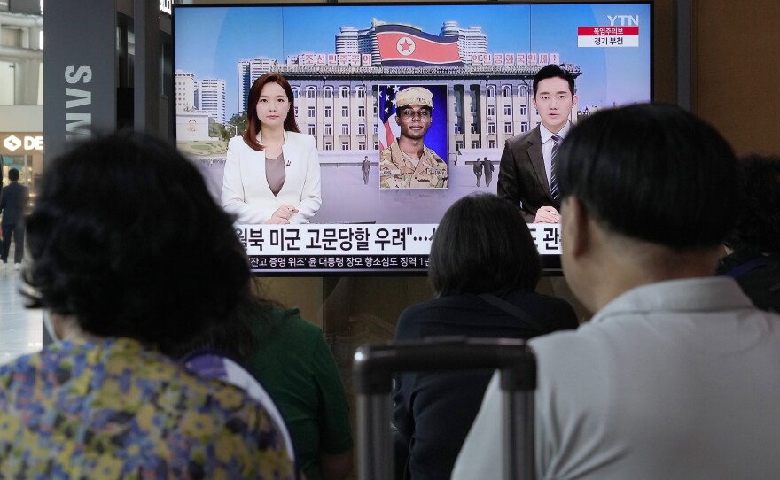 A TV screen shows a file image of American soldier Travis King during a news program at the Seoul Railway Station in Seoul, South Korea, on Saturday.