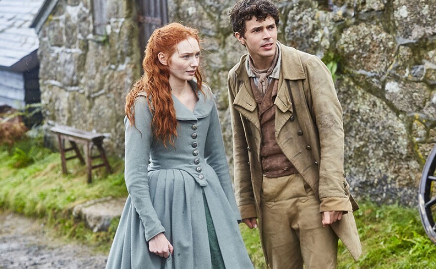 Left to right: Eleanor Tomlinson as Demelza Poldark and Harry Richardson as Drake Carne.