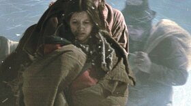 Still photo from a reenactment of Cherokee forced from their homes from the film "We Shall Remain: Trail Of Tears." The Cherokee would call it Nu-No-Du-Na-Tlo-Hi-Lu, "The Trail Where They Cried." Despite decades of struggle to keep their land, in 1838 thousands of Cherokee were forced from their homes in the southeastern United States, driving them toward Indian Territory in eastern Oklahoma. More than 4,000 died of disease and starvation along the way.