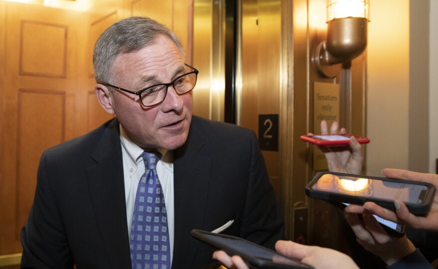 Sen. Richard Burr, R-N.C., speaks with reporters at the Capitol in February.