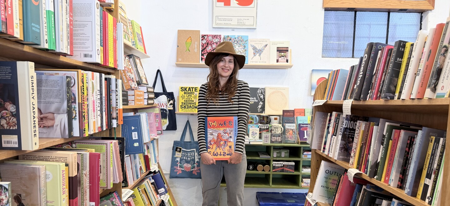 Artist Britton Neubacher was part of the team to archive and compile a new collection of visual art by her partner, late rocker Rick Fröberg. Neubacher holds the book at The Book Catapult in South Park on Jan. 12, 2026.