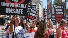 File photo of anti-vaccination protesters in downtown San Diego taken on Sept. 18, 2019.