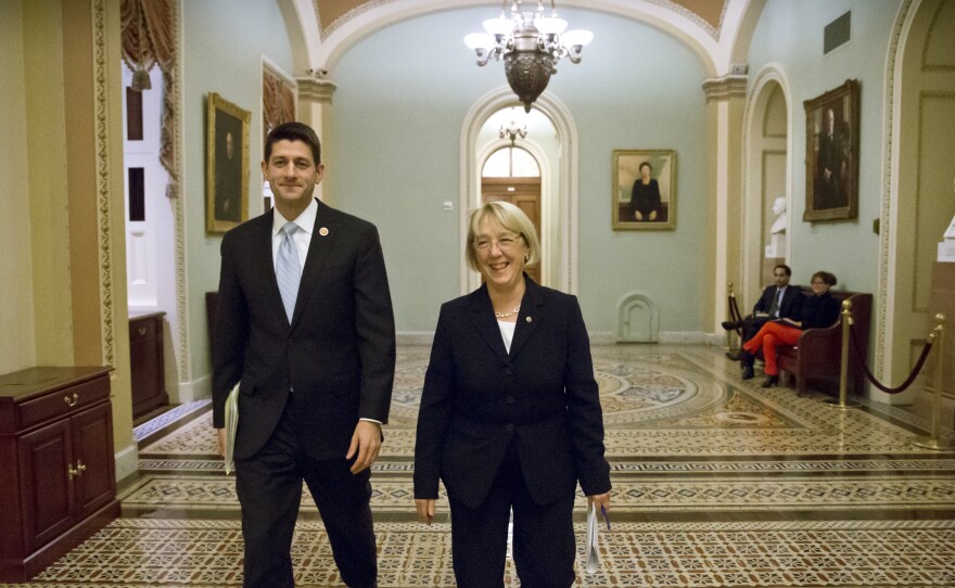 House Budget Committee Chairman Paul Ryan, R-Wis., left, and Senate Budget Committee Chairwoman Patty Murray, D-Wash., walk to announce a tentative agreement Tuesday between Republican and Democratic negotiators on a government spending plan.