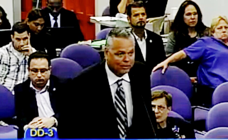 Scot Peterson addresses a Broward County school board meeting in 2015. The former school resource officer, criticized for remaining outside during the school shooting in Parkland, Fla., began receiving a monthly pension of more than $8,000 in April.