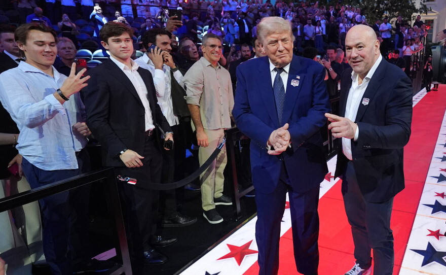 President Donald Trump and Dana White, UFC president and CEO, arrive for UFC Freedom 250 on the South Lawn of the White House, Sunday, June 14, 2026, in Washington.