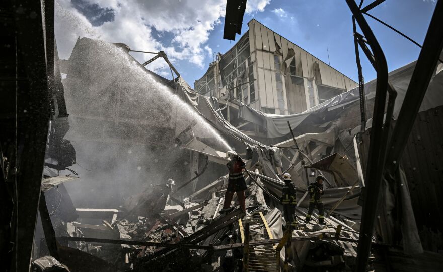 Firemen extinguish a fire at a gypsum manufacturing plant after shelling in the city of Bakhmut, in the eastern Ukrainian region of Donbas, on Friday. Russia pressed on with a deadly offensive to capture key points in the Donbas this week.