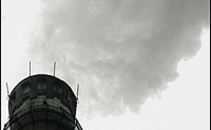 Gas emissions belch from the giant chimney of a power station in Beijing. China is the world's second-biggest greenhouse-gas emitter after the United States, but is a member of the Kyoto Protocol.