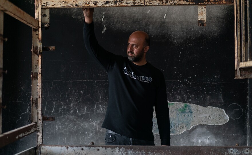 Ibrahim Fatthi, 34 surveys the damage outside his home after the violent attack on the Palestinian village Duma by Israeli settlers on April 13th.15 homes were damaged by arson and six residents injured by bullets, according to the head of the village council. April 18, 2024.